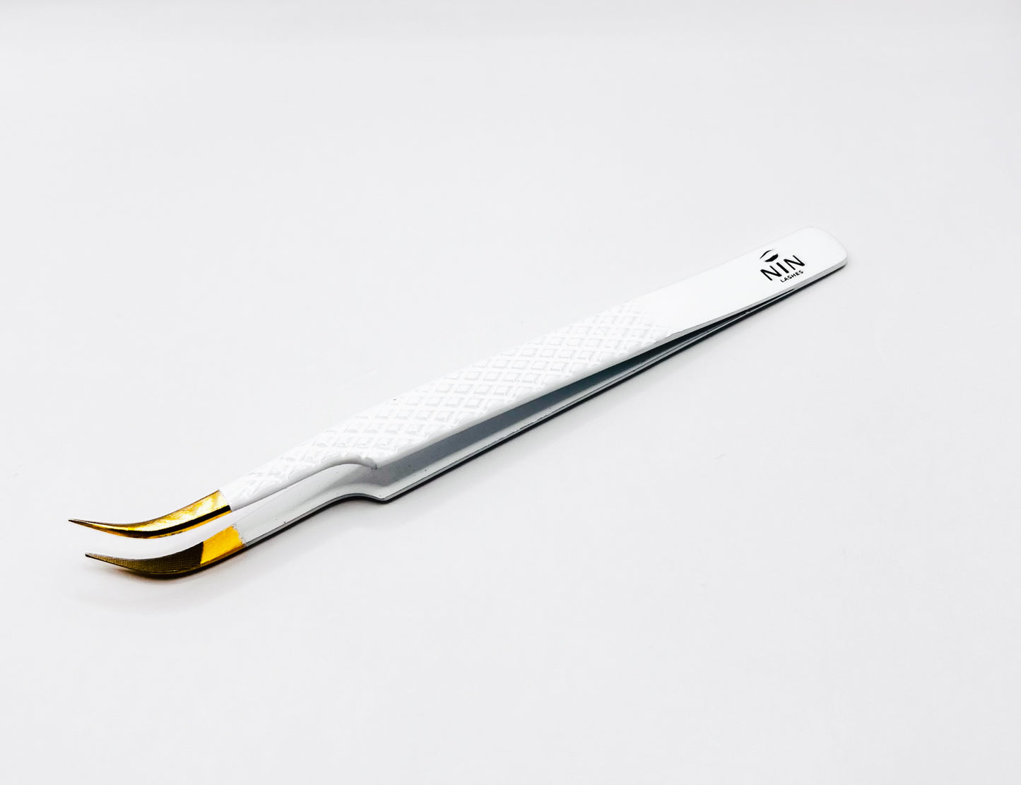 Fiber Tip Hybrid Angle Tweezer