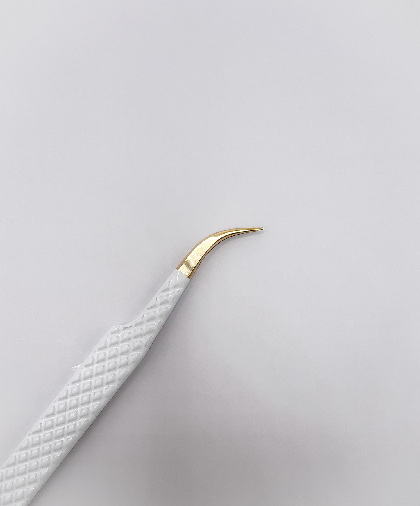 Fiber Tip Hybrid Angle Tweezer